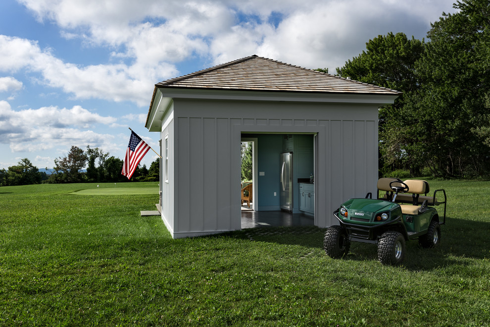 Small elegant detached garden shed photo in New York
