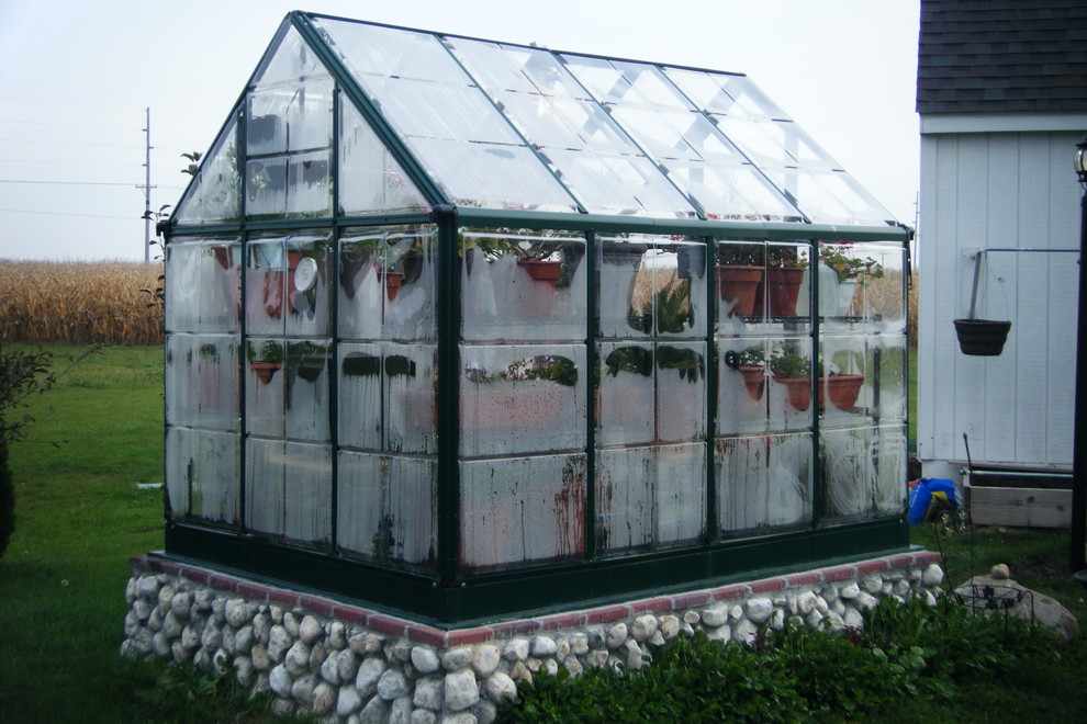 Greenhouse addition with stone foundation Traditional Shed