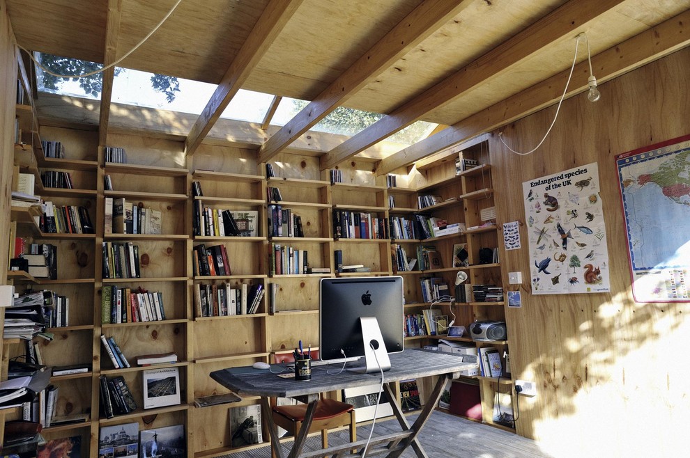 Example of an eclectic home office design in London