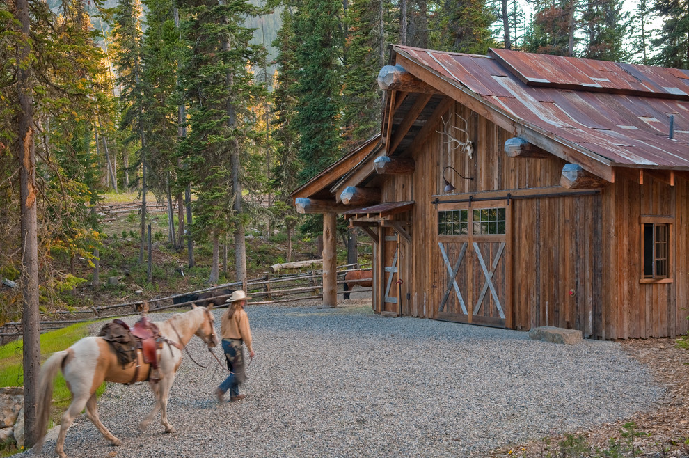 Example of a mountain style barn design in Other