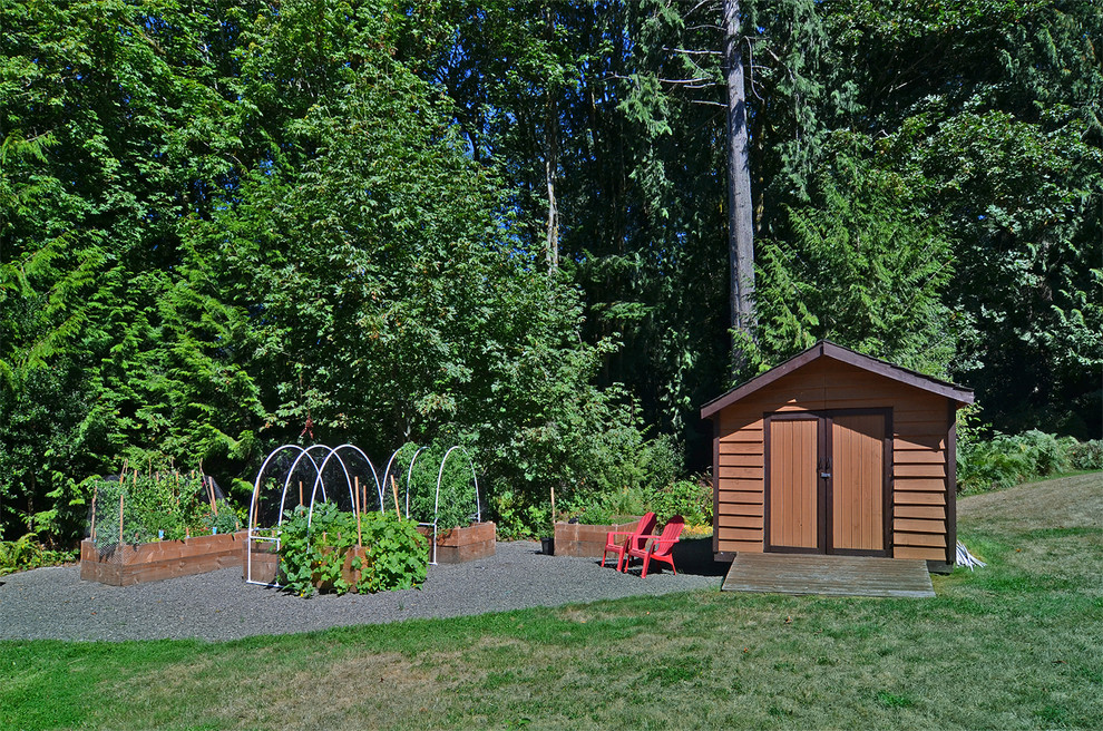Small mountain style detached garden shed photo in Seattle