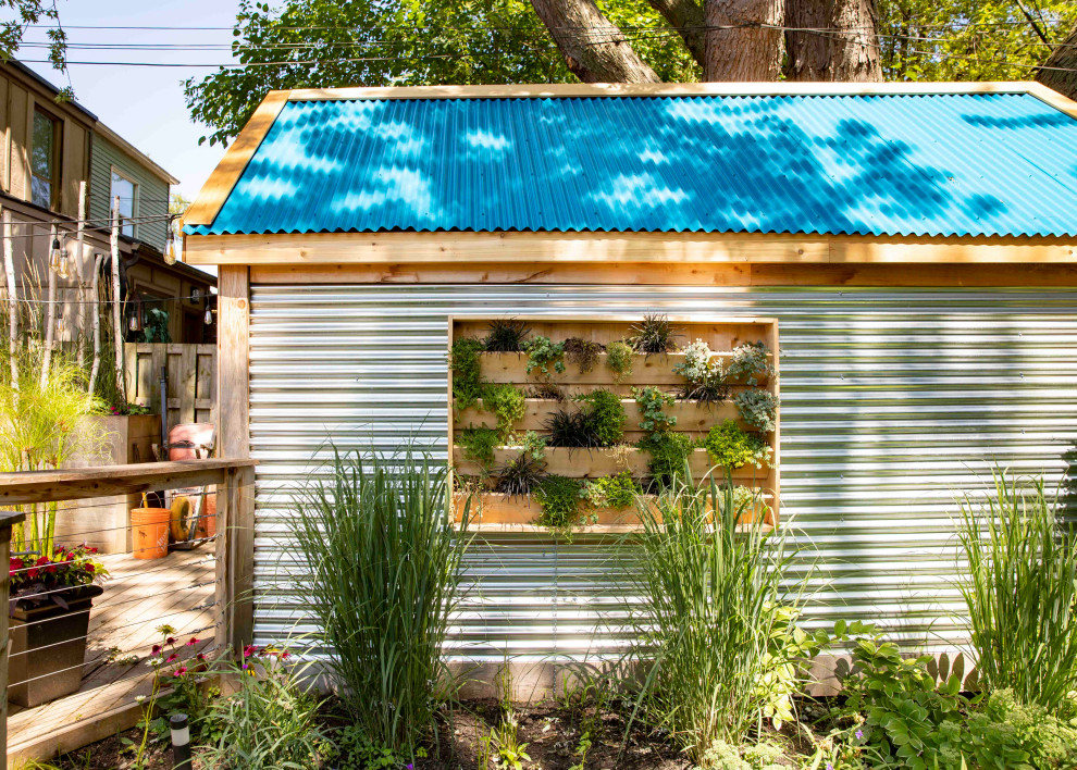 This is an example of an eclectic garden shed and building in Toronto.