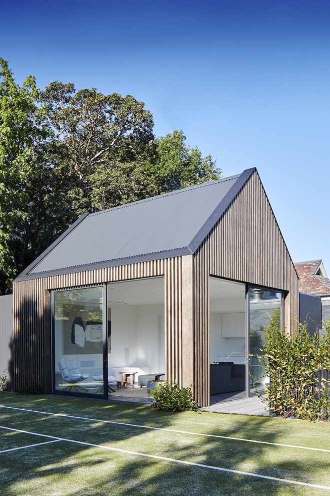 Стильный дизайн: отдельно стоящий домик для гостей в современном стиле - последний тренд