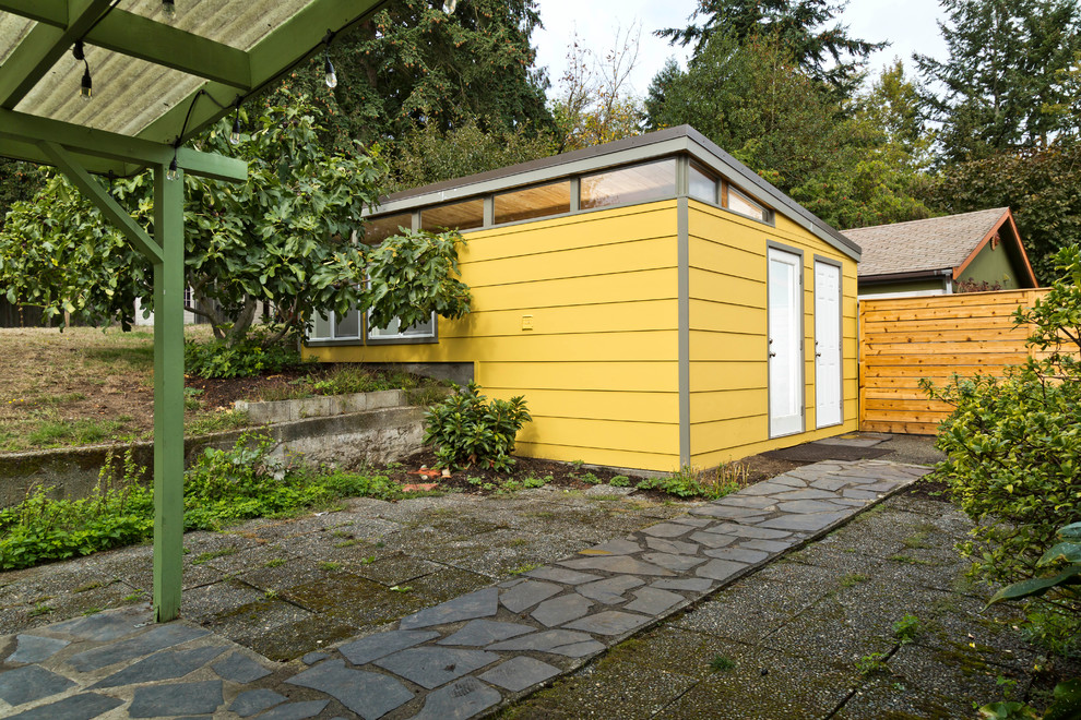 Design ideas for a medium sized retro detached office/studio/workshop in Seattle.