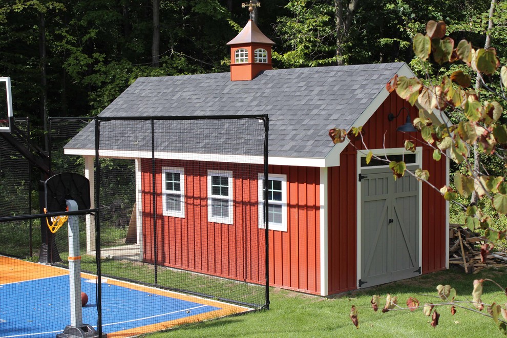 Example of a mid-sized mountain style detached barn design in Boston