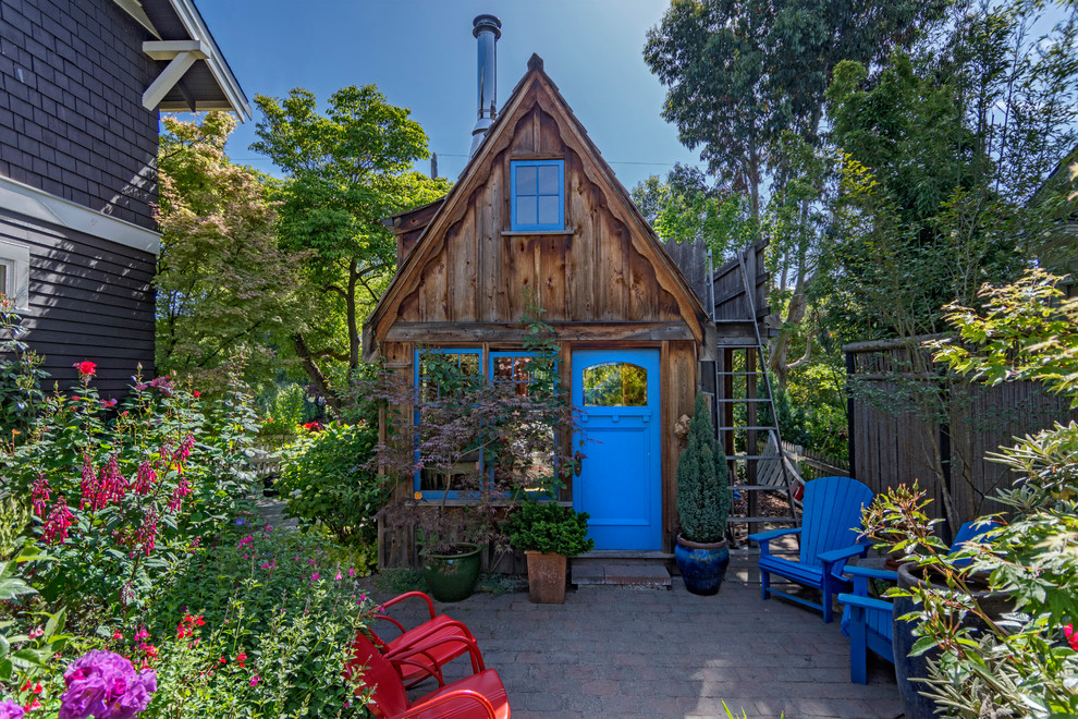 Photo of a rustic detached garden shed and building in Seattle.