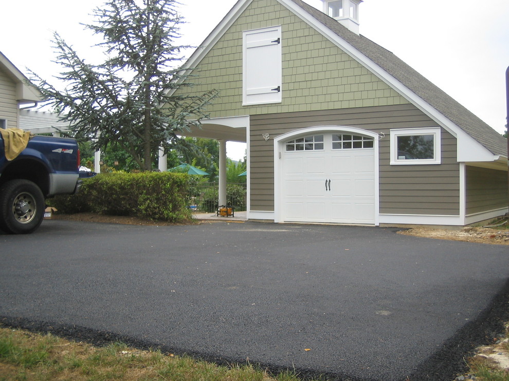Example of a cottage garage design in New York