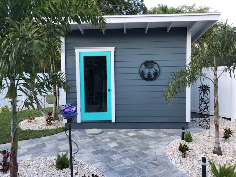 Example of a small minimalist detached studio / workshop shed design in Tampa