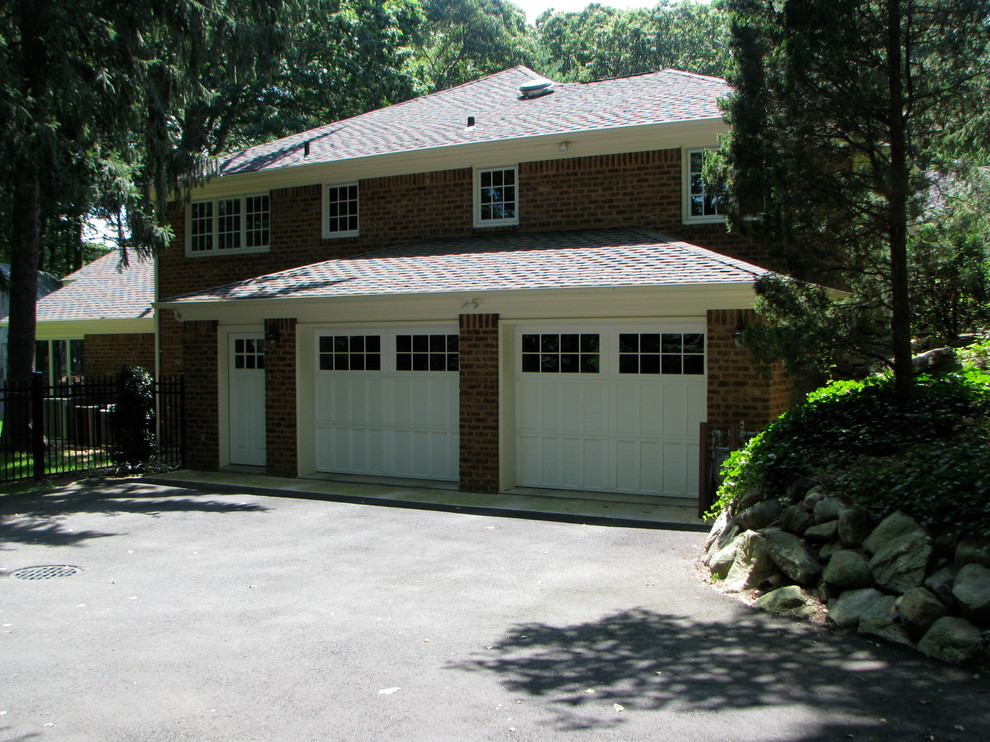 Example of a mid-century modern garage design in New York