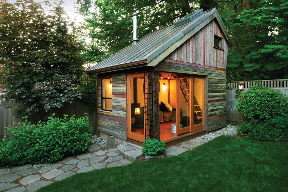 Inspiration for a rustic detached shed remodel in Portland