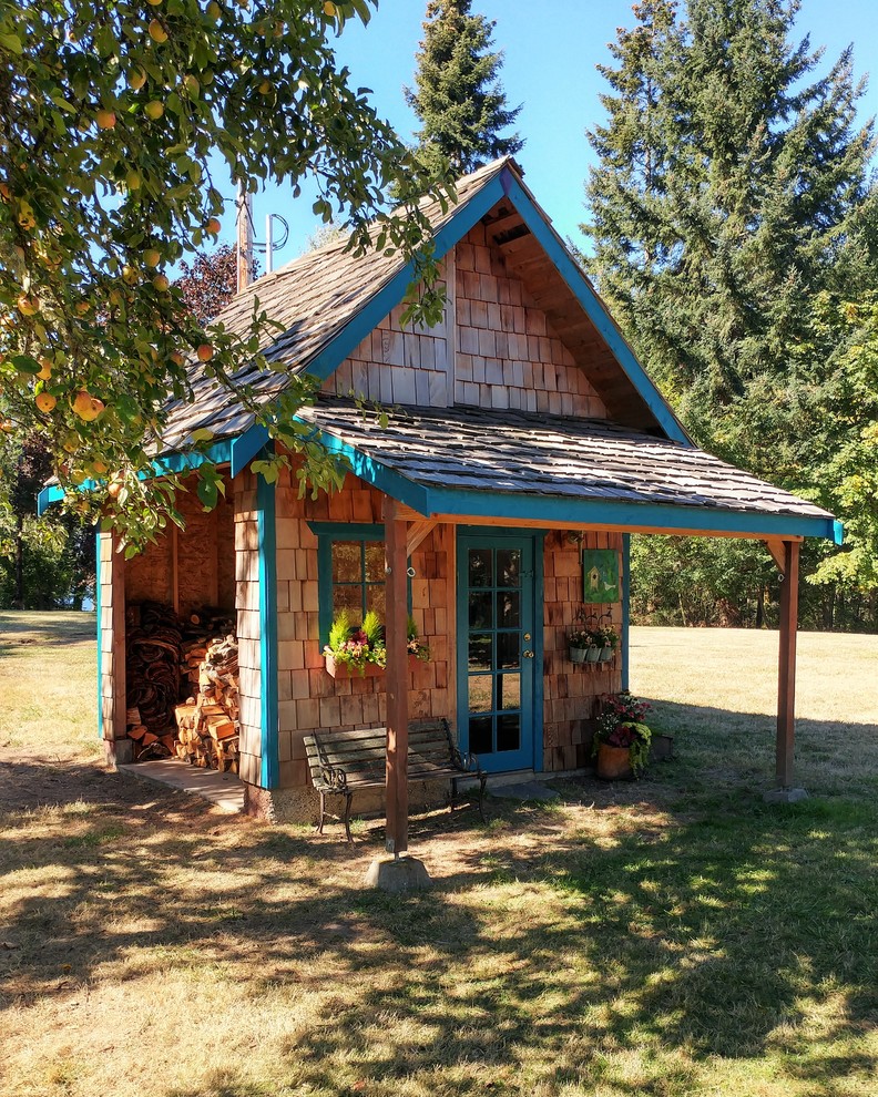 Garden shed - mid-sized rustic detached garden shed idea in Seattle