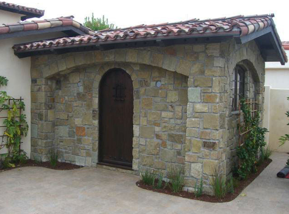 This is an example of a medium sized mediterranean attached garden shed in San Luis Obispo.