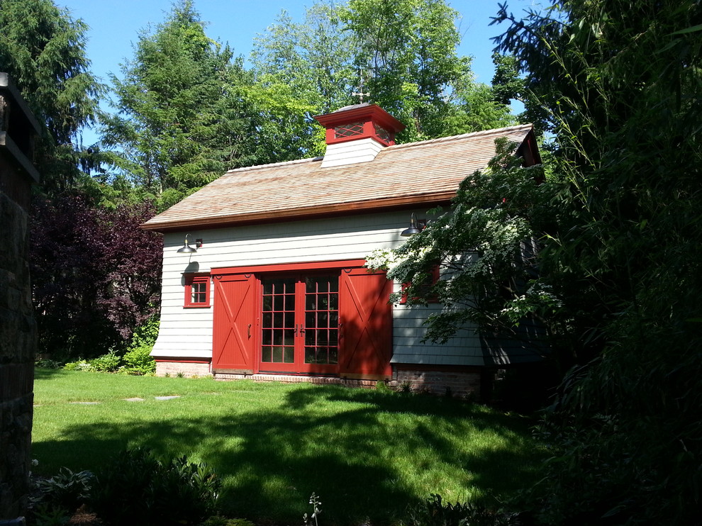 Photo of a traditional detached garden shed and building in New York.