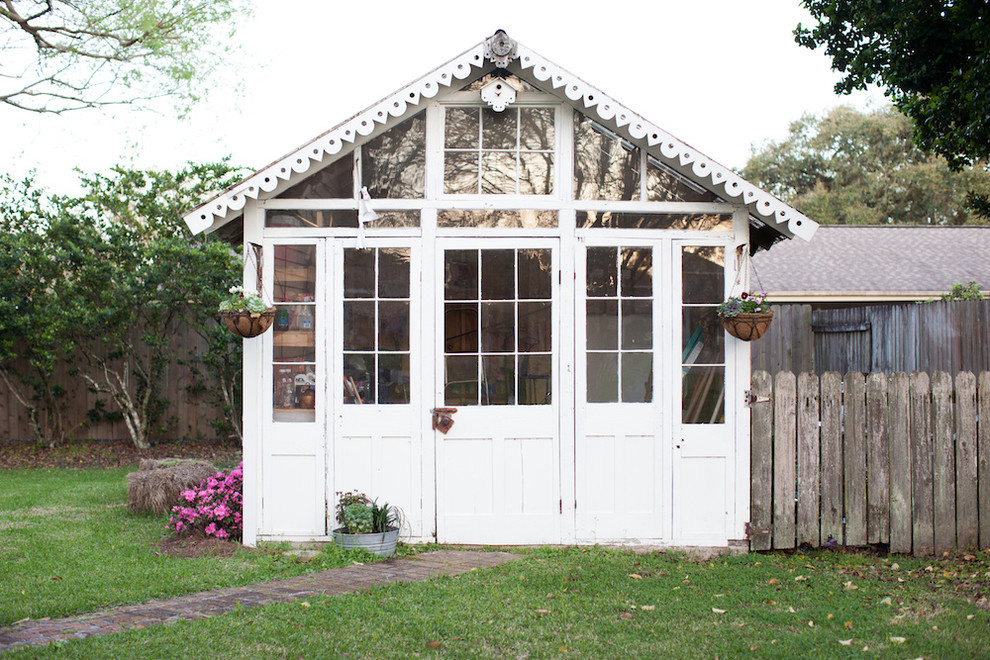 Large farmhouse detached garden shed photo in New Orleans