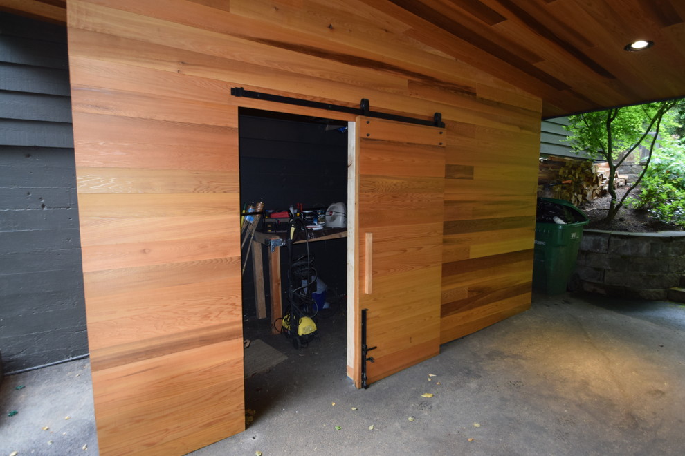 Photo of a medium sized modern attached garden shed and building in Portland.