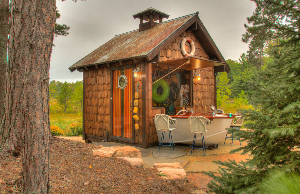 This is an example of a small rustic detached garden shed and building in Minneapolis.