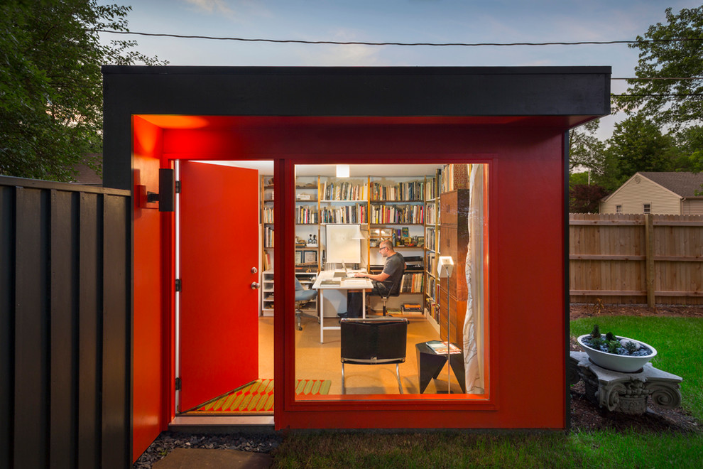 This is an example of a small modern garden shed and building in Kansas City.