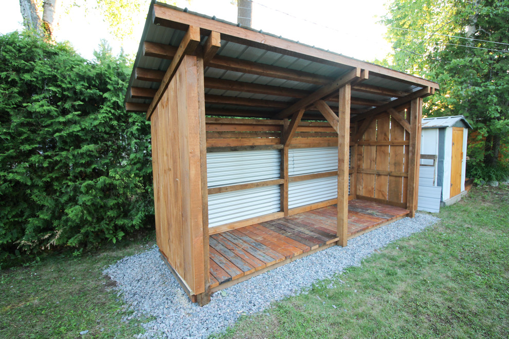 This is an example of a medium sized classic detached garden shed and building in Ottawa.