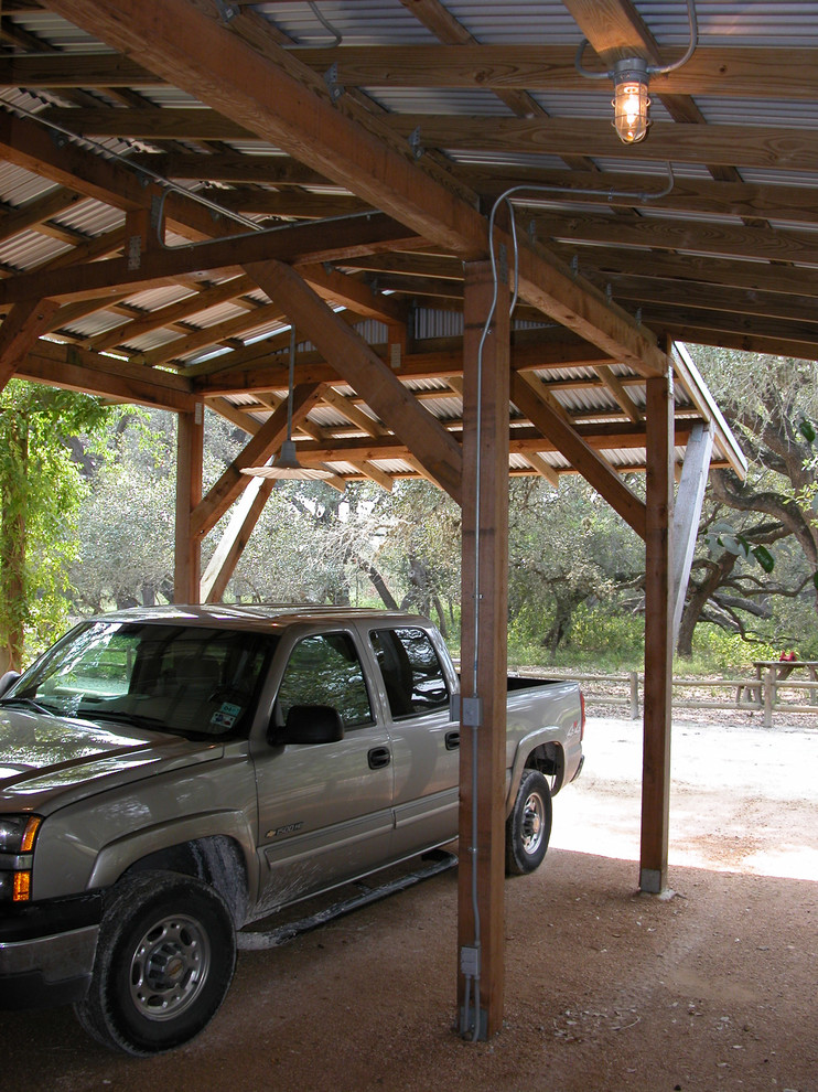 Example of a cottage garage design in Austin