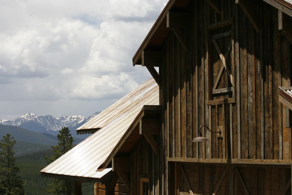 Inspiration for a large rustic detached barn in Denver.