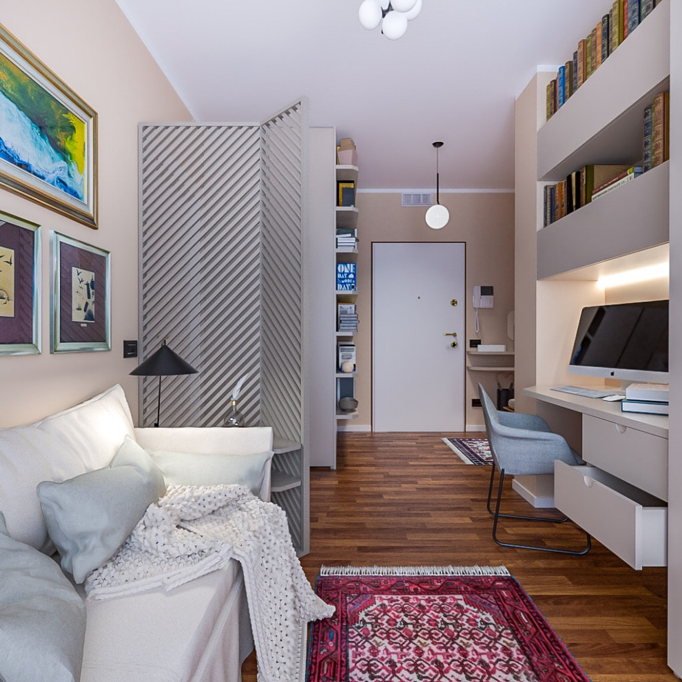 Стильный дизайн: маленькая открытая гостиная комната в современном стиле с с книжными шкафами и полками и розовыми стенами для на участке и в саду - последний тренд