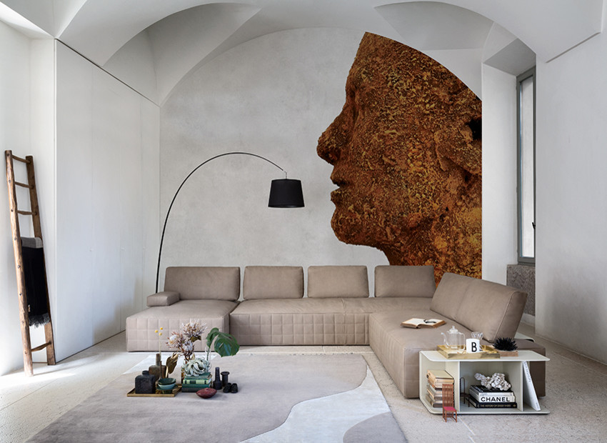 ボローニャにある広いコンテンポラリースタイルのおしゃれな独立型ファミリールーム (マルチカラーの壁、大理石の床) の写真
