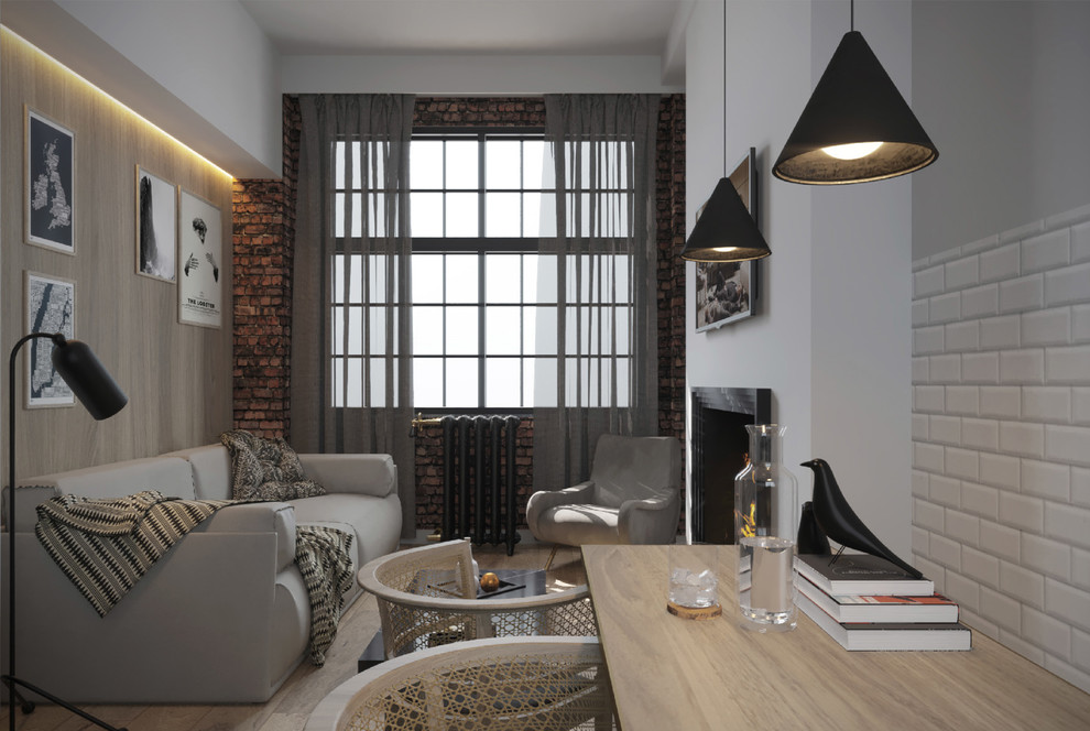Kleines, Fernseherloses, Abgetrenntes Modernes Wohnzimmer mit weißer Wandfarbe, braunem Holzboden, Kaminumrandung aus Stein und Tunnelkamin in London