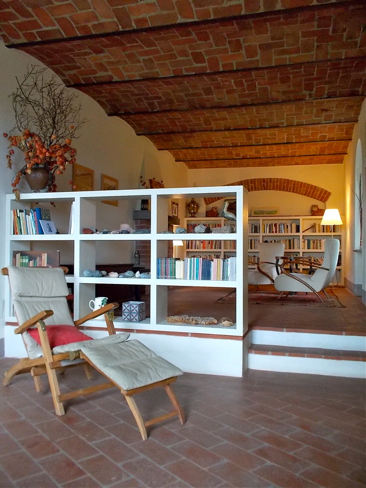 Example of a cottage family room design in Turin