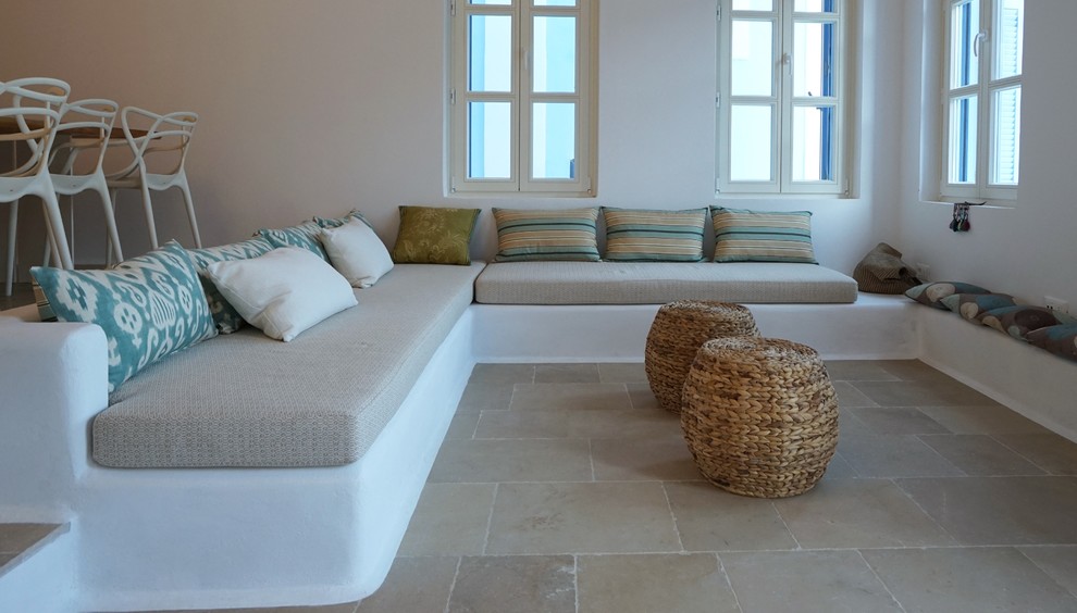 Living room - coastal living room idea in Milan