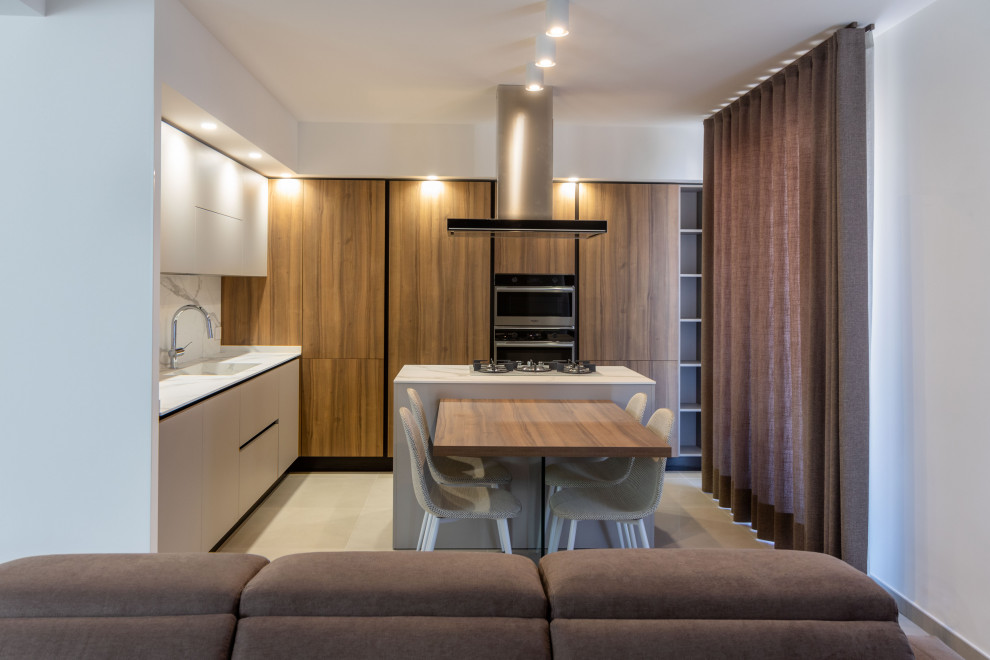 Esempio di una cucina minimalista con pavimento grigio
