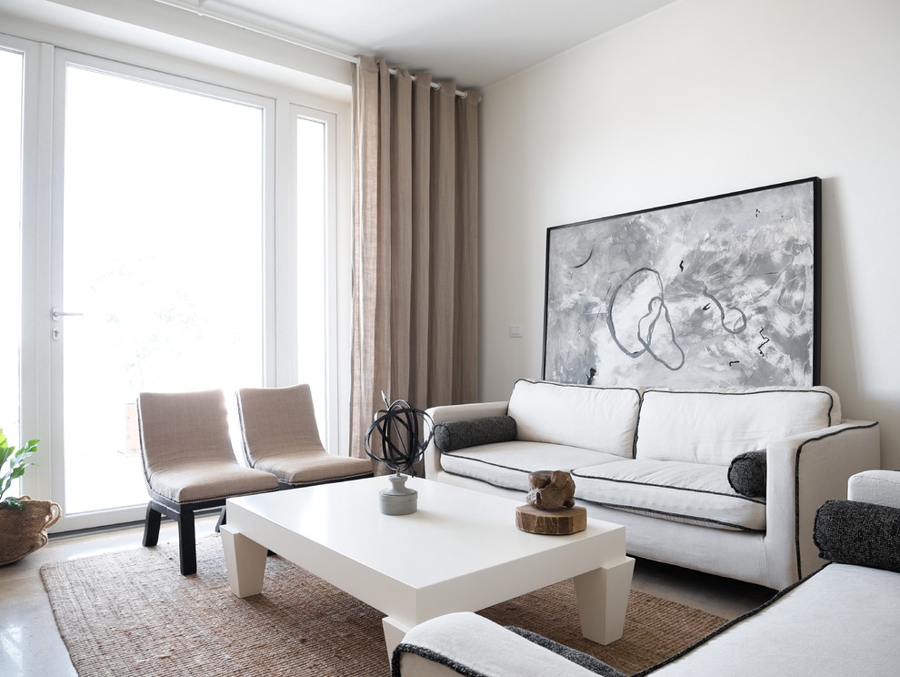 Foto di un soggiorno contemporaneo con pareti bianche, pavimento grigio e tappeto