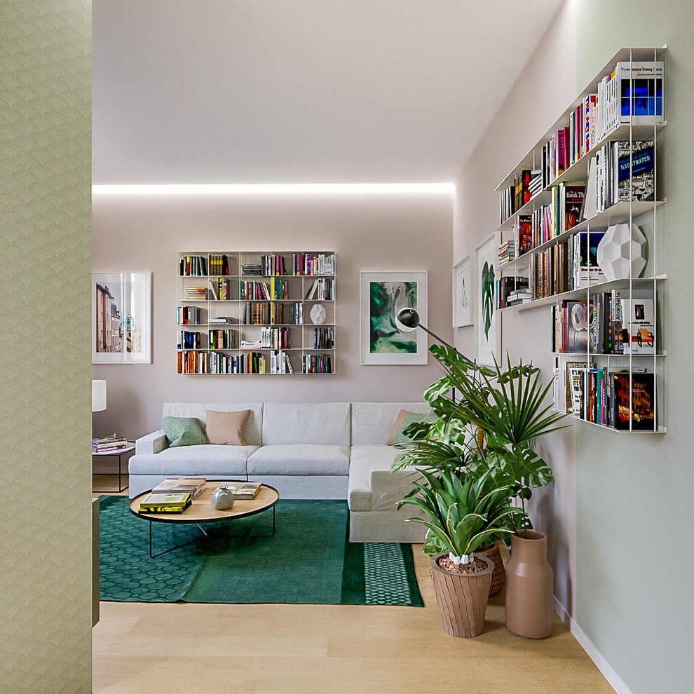 Idée de décoration pour une salle de séjour design de taille moyenne et ouverte avec une bibliothèque ou un coin lecture, parquet clair et un sol beige.