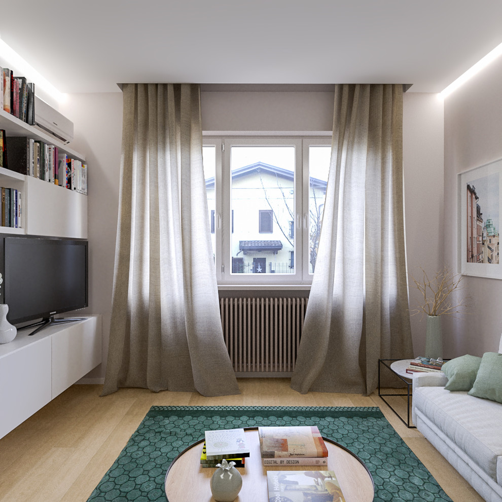 Foto di un soggiorno contemporaneo di medie dimensioni e aperto con libreria, pareti beige, parquet chiaro e parete attrezzata