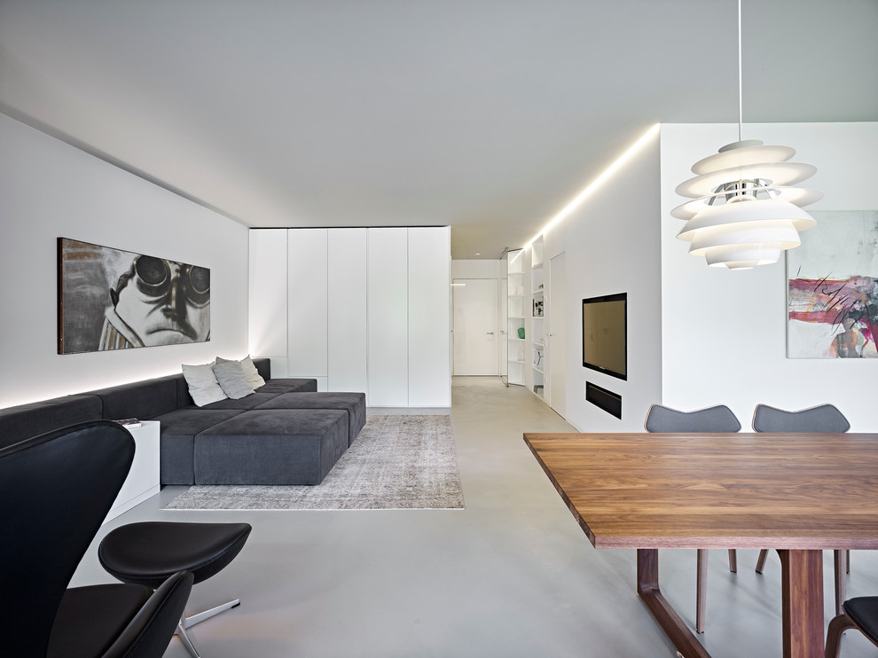 Источник вдохновения для домашнего уюта: открытая гостиная комната в современном стиле с белыми стенами