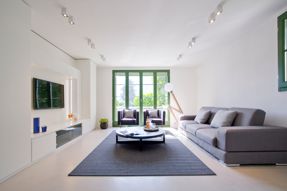 Esempio di un grande soggiorno contemporaneo aperto con pareti bianche e pavimento in gres porcellanato