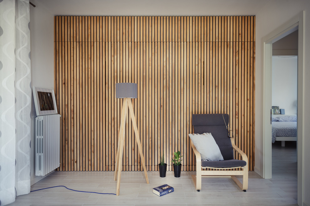 Esempio di un soggiorno minimal di medie dimensioni e aperto con pareti bianche
