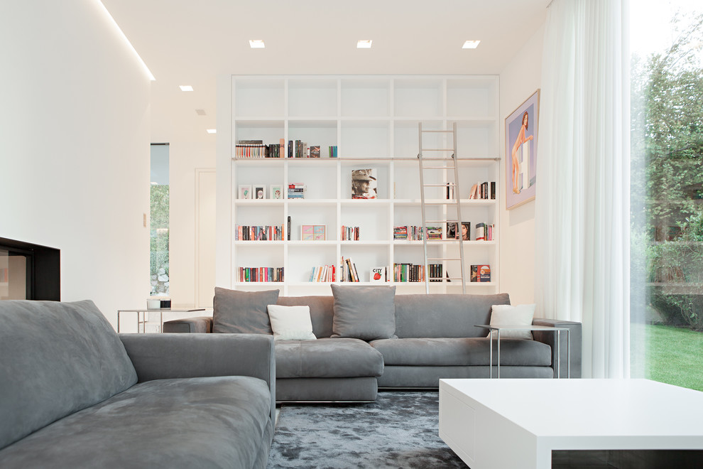 Contemporary living room in Other with white walls.