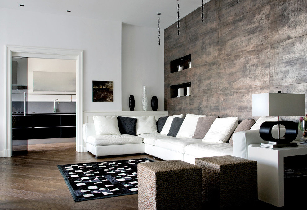 Trendy dark wood floor living room photo in Naples with white walls
