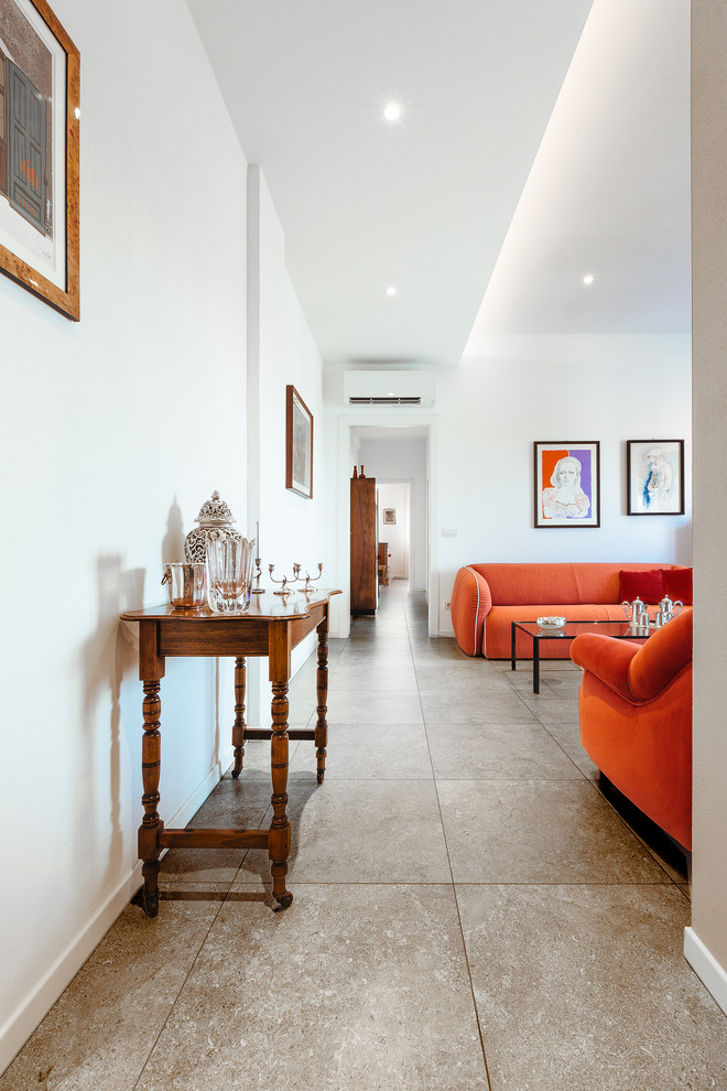 Idée de décoration pour un salon design de taille moyenne et ouvert avec une salle de réception, un mur blanc, un sol en carrelage de porcelaine, un sol gris et un plafond décaissé.