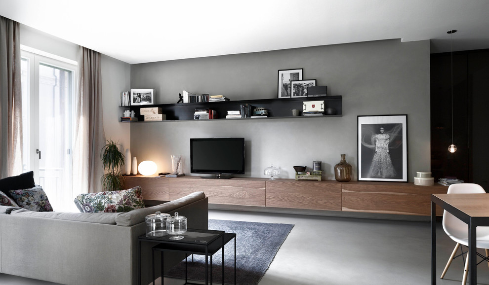 Example of a mid-sized trendy open concept living room design in Rome