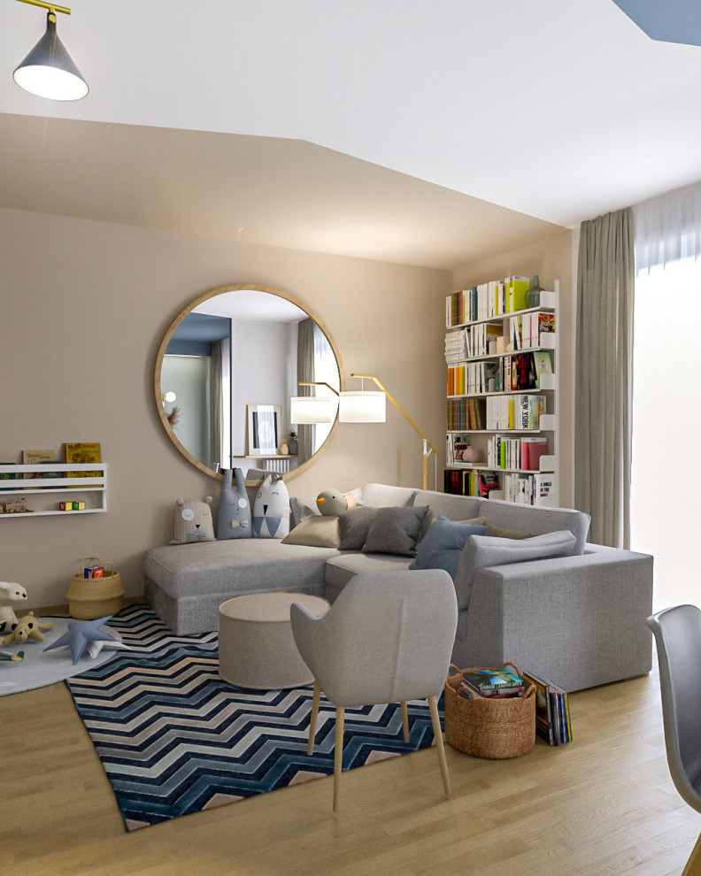 Exemple d'un salon tendance avec une bibliothèque ou un coin lecture, un mur beige et parquet clair.