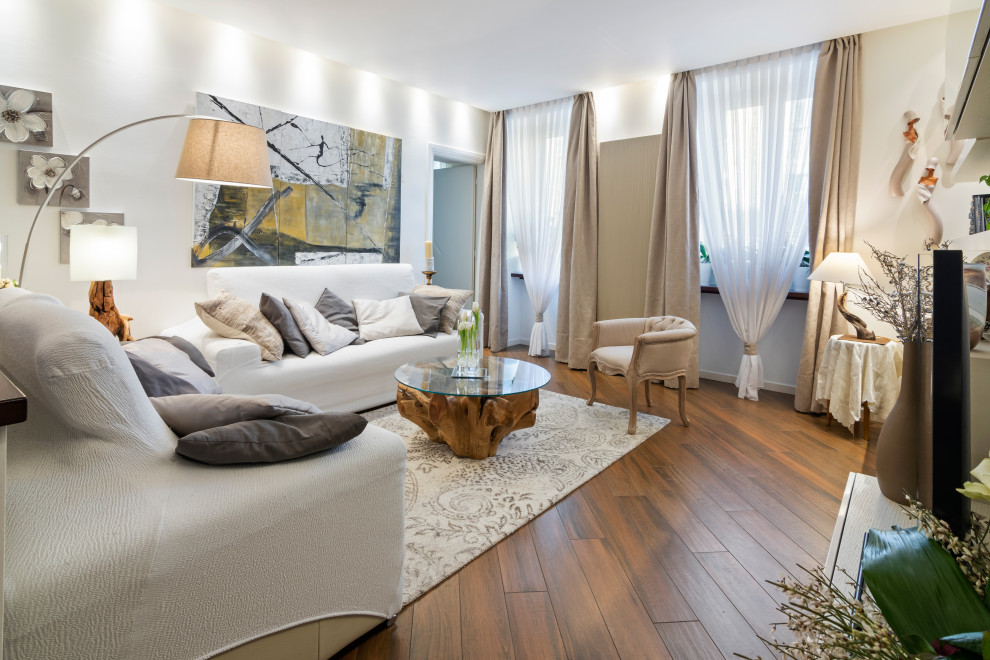 Photo of a large contemporary mezzanine living room in Other with multi-coloured walls, porcelain flooring, a hanging fireplace, a metal fireplace surround, a built-in media unit, brown floors and a drop ceiling.