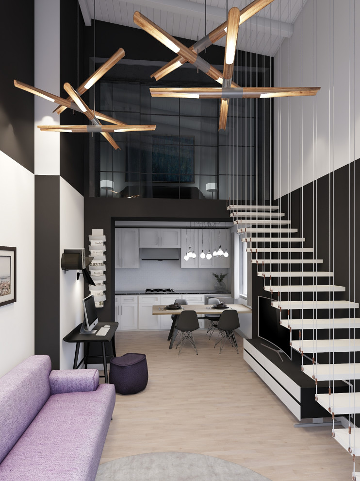 Diseño de salón tipo loft moderno de tamaño medio con paredes multicolor, suelo de madera clara y machihembrado