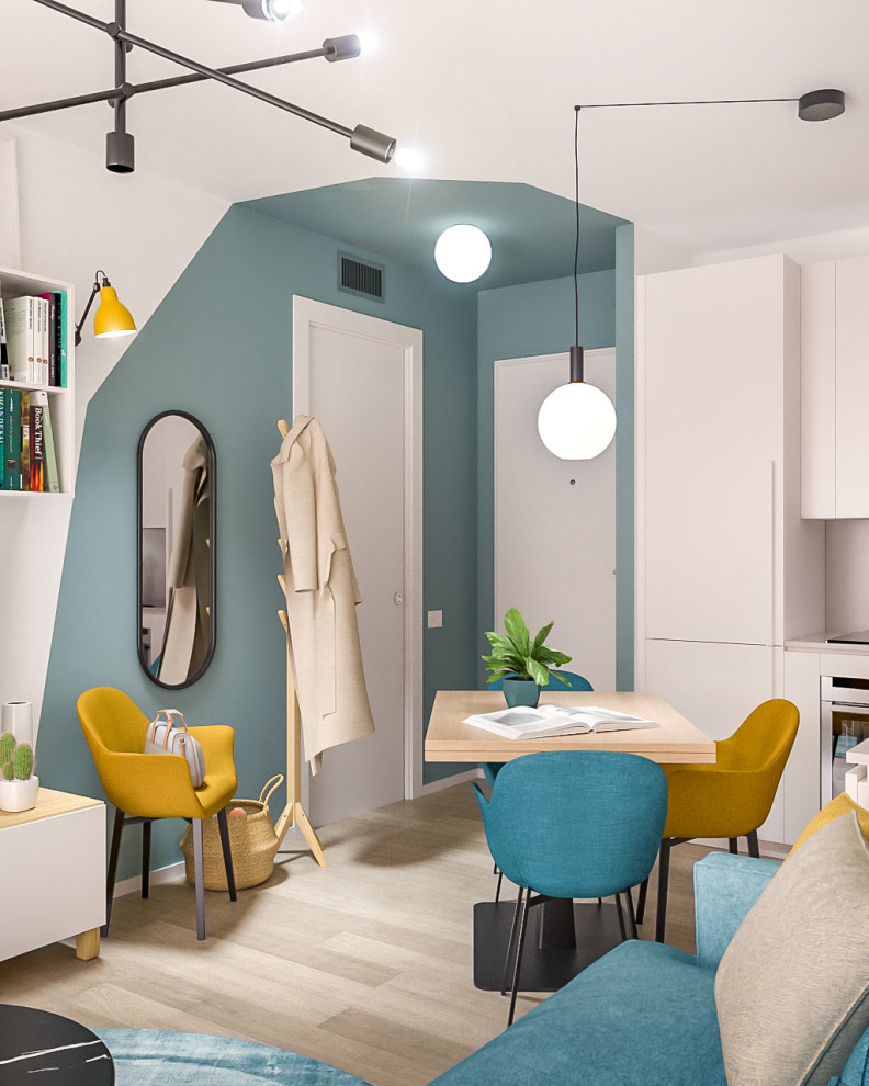 Immagine di un piccolo soggiorno contemporaneo aperto con pareti multicolore e parquet chiaro
