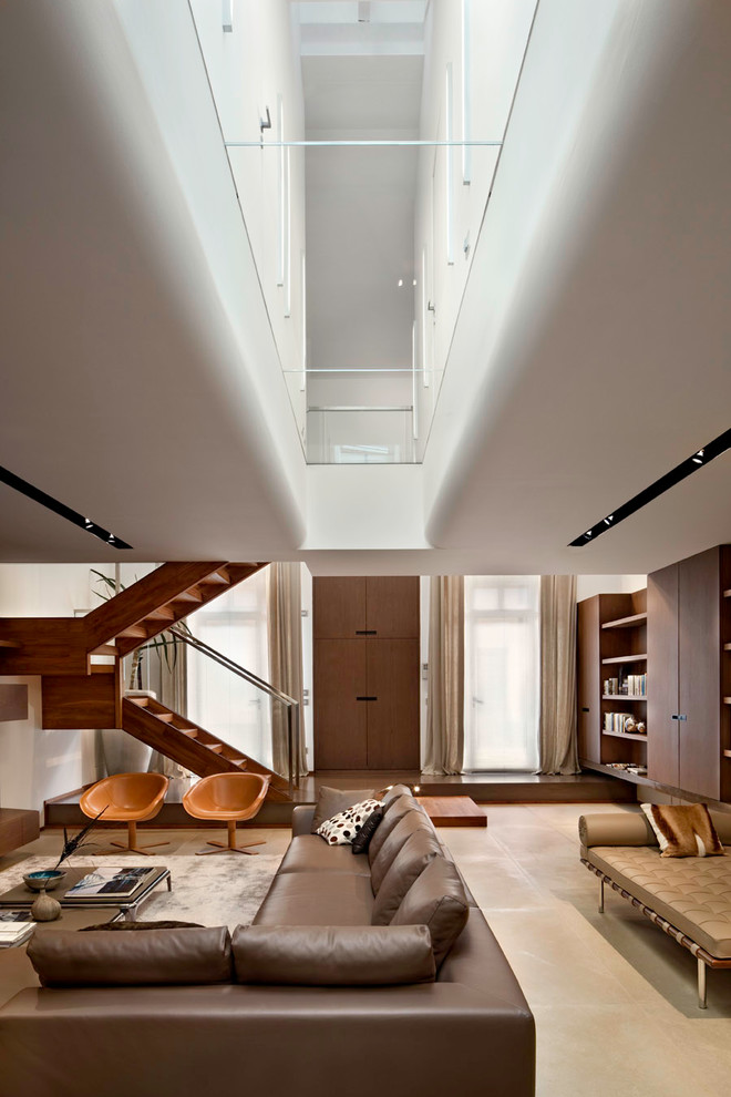 Photo of a contemporary open plan living room in Milan.