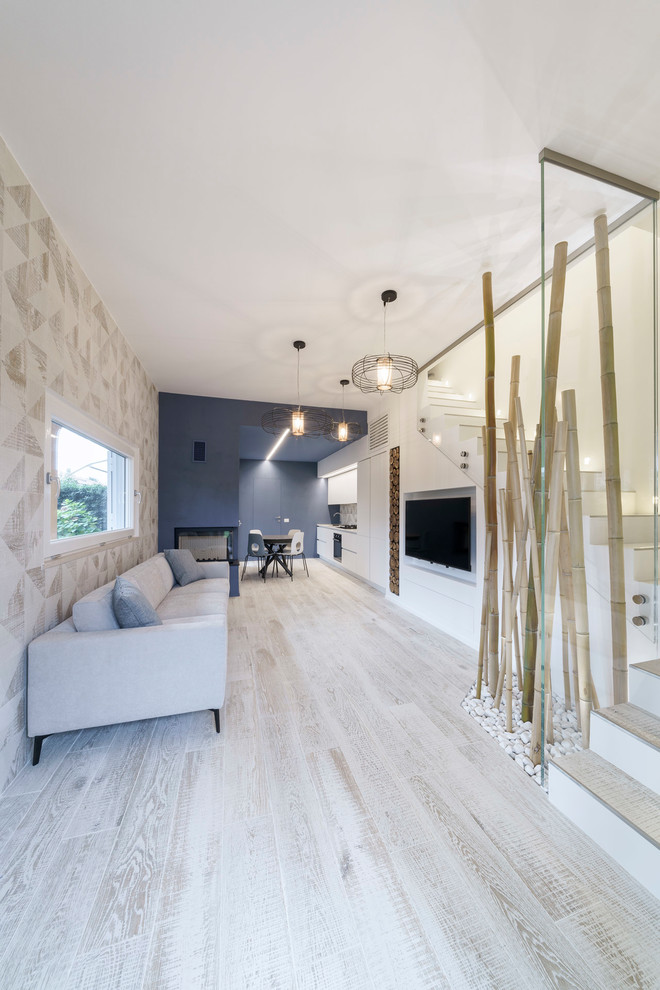Стильный дизайн: гостиная комната среднего размера в скандинавском стиле - последний тренд