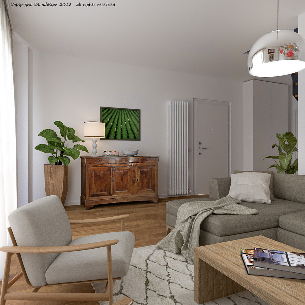 Ispirazione per un soggiorno design di medie dimensioni e aperto con pareti beige, parquet chiaro, nessuna TV e pavimento marrone