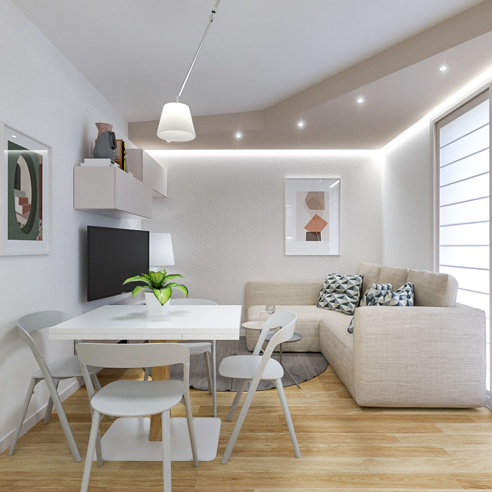Kleines, Offenes Modernes Wohnzimmer mit weißer Wandfarbe, hellem Holzboden und Multimediawand in Mailand