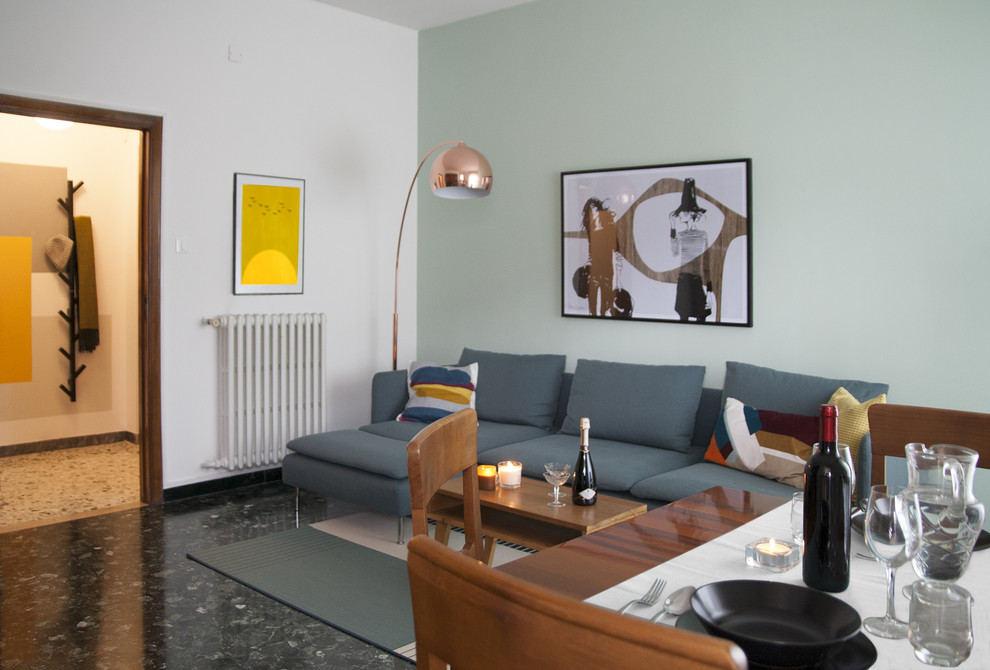 Diseño de salón cerrado vintage de tamaño medio con paredes verdes, suelo de mármol y suelo negro