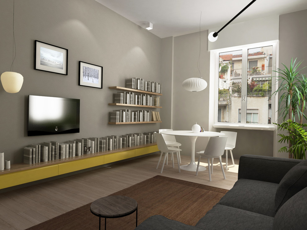 Diseño de salón minimalista con paredes grises y suelo de madera clara